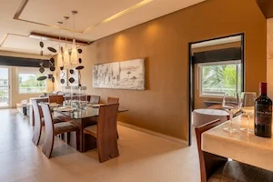 https://www.palmarbeachresortandspa.com.mx/galleries/Suites/DINNING AREA ONE BEDROOM OCEAN FRONT SUITE.webp